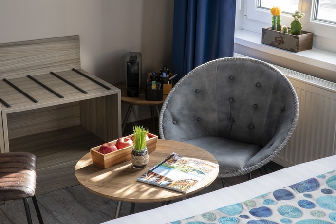 Imagen de la habitación del Hotel Cocoon Inn. Foto 17