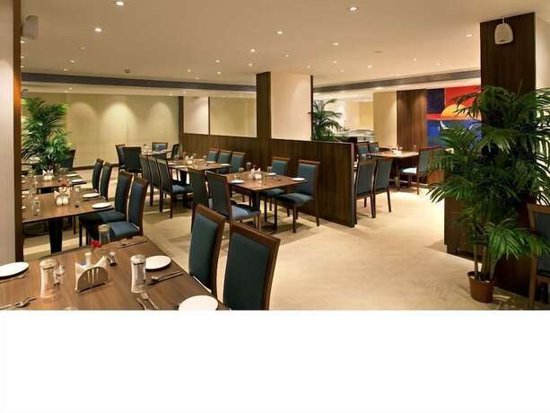 Imagen del bar/restaurante del Hotel Cocoon, Pune. Foto 16