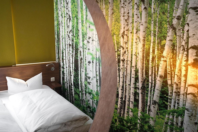 Imagen de la habitación del Hotel Cocoon Stachus. Foto 11