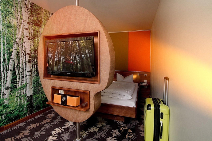 Imagen de la habitación del Hotel Cocoon Stachus. Foto 12