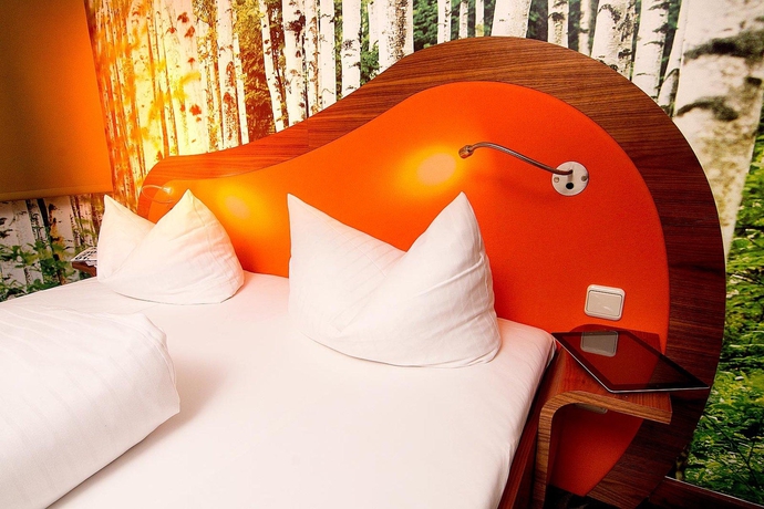 Imagen de la habitación del Hotel Cocoon Stachus. Foto 13