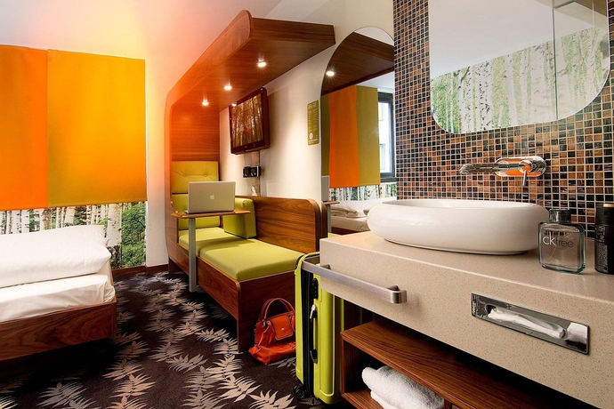 Imagen de la habitación del Hotel Cocoon Stachus. Foto 14