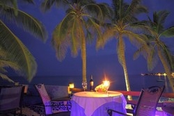 Imagen del bar/restaurante del Hotel Cocoplum Beach. Foto 2