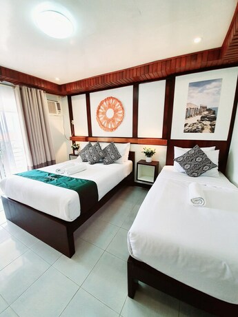 Imagen de la habitación del Hotel Cocotel Rsam Beach Resort. Foto 16