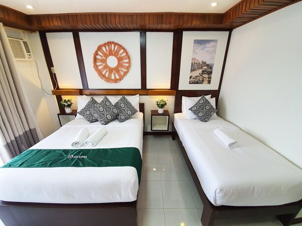 Imagen de la habitación del Hotel Cocotel Rsam Beach Resort. Foto 19