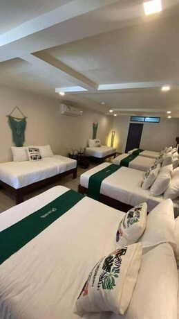 Imagen de la habitación del Hotel Cocotel Rsam Beach Resort. Foto 21