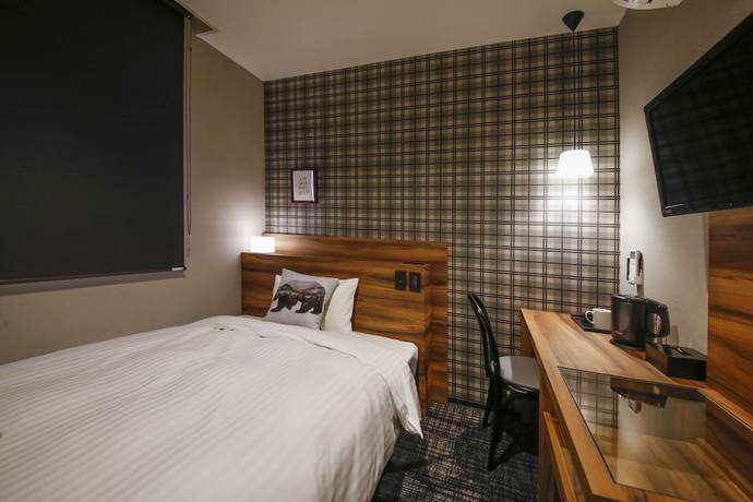 Imagen de la habitación del Hotel Code Shinsaibashi. Foto 4