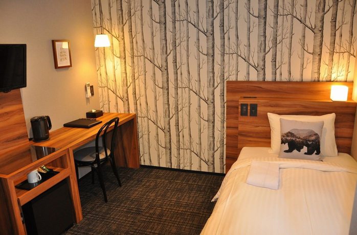 Imagen de la habitación del Hotel Code Shinsaibashi. Foto 7