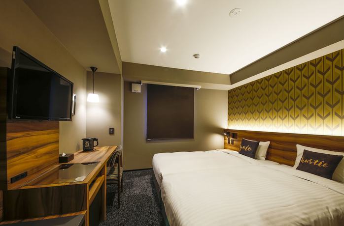 Imagen de la habitación del Hotel Code Shinsaibashi. Foto 9