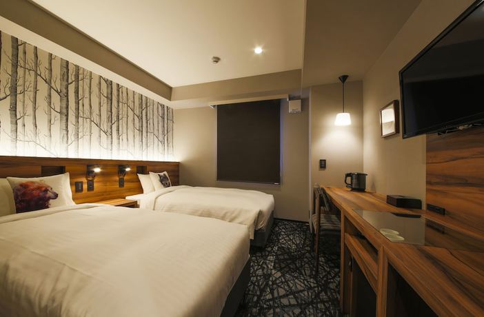 Imagen de la habitación del Hotel Code Shinsaibashi. Foto 10