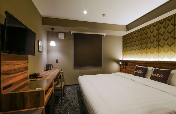 Imagen de la habitación del Hotel Code Shinsaibashi. Foto 11