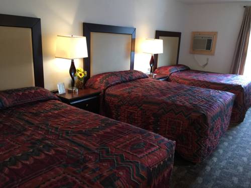 Imagen de la habitación del Hotel Cody Holiday Lodge. Foto 10