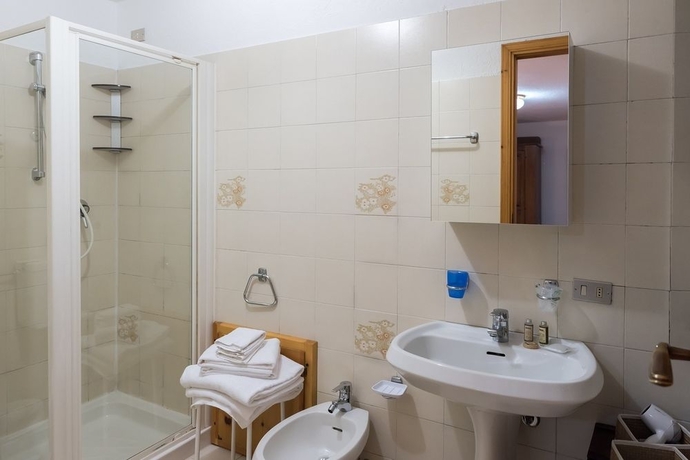 Imagen de la habitación del Hotel Coeur du Village. Foto 5