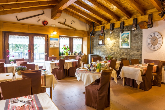 Imagen del bar/restaurante del Hotel Coeur du Village. Foto 1