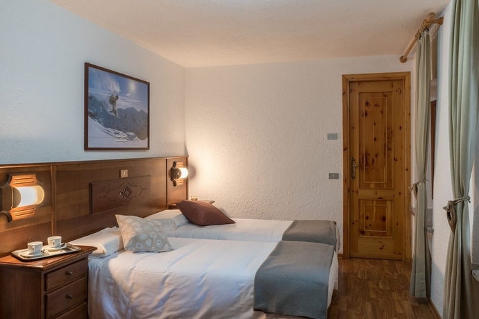 Imagen de la habitación del Hotel Coeur du Village. Foto 6