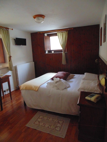Imagen de la habitación del Hotel Coeur du Village. Foto 8