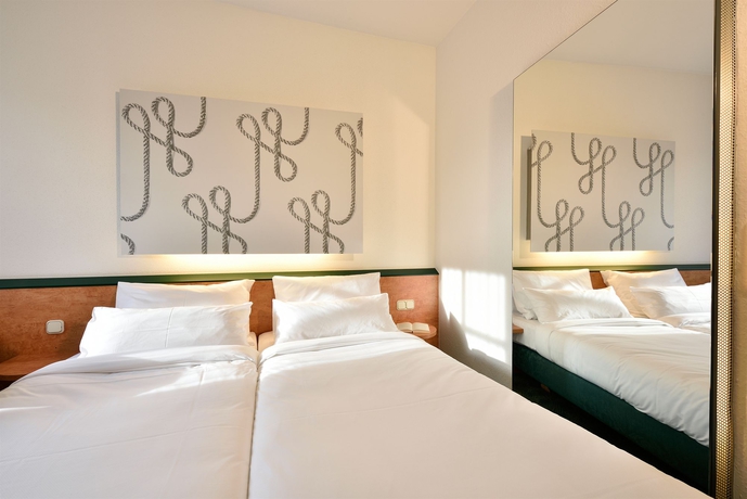 Imagen de la habitación del Hotel Coffee Fellows Puchheim. Foto 10