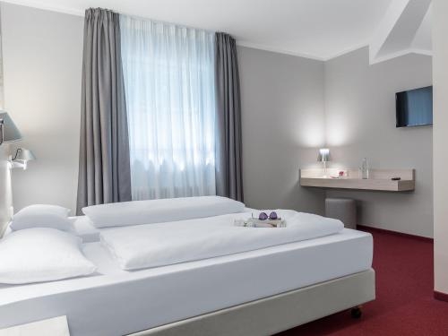Imagen de la habitación del Hotel Coffee Fellows Siegburg West. Foto 9