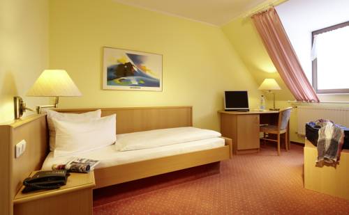 Imagen de la habitación del Hotel Coffee Fellows Trier. Foto 13