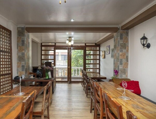 Imagen del bar/restaurante del Hotel Coffee Swings Lodging House. Foto 13