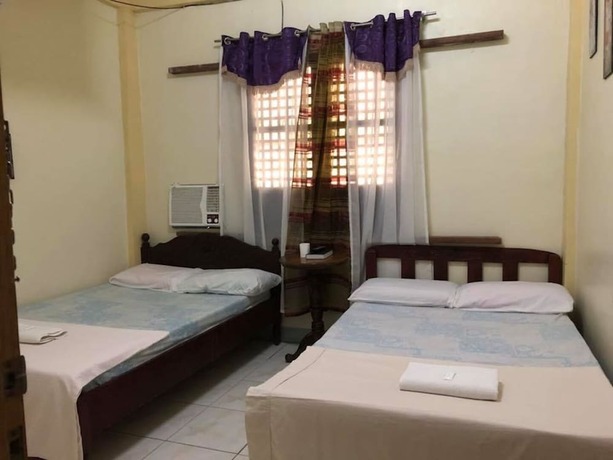 Imagen de la habitación del Hotel Coffee Swings Lodging House. Foto 14