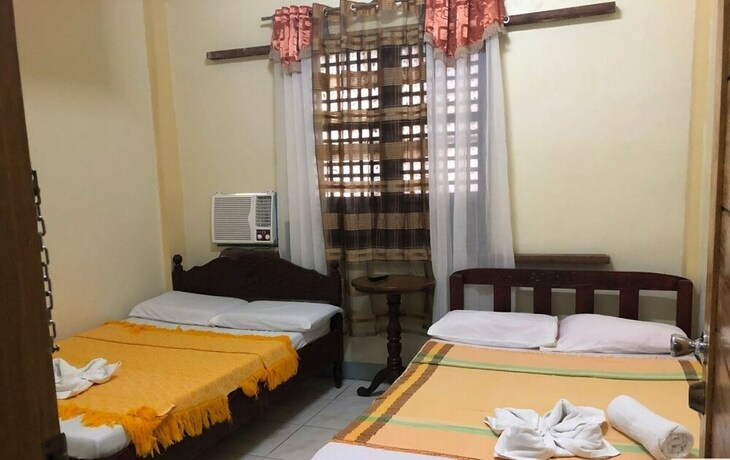 Imagen de la habitación del Hotel Coffee Swings Lodging House. Foto 19