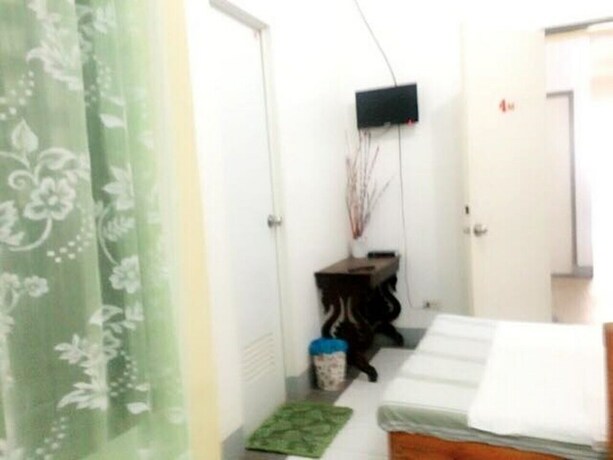 Imagen de la habitación del Hotel Coffee Swings Lodging House. Foto 20