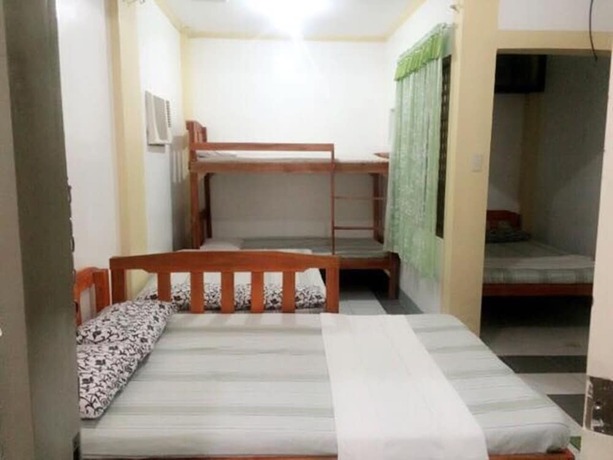 Imagen de la habitación del Hotel Coffee Swings Lodging House. Foto 24