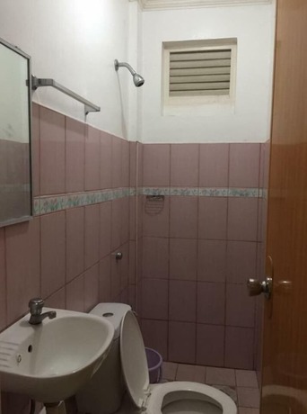 Imagen de la habitación del Hotel Coffee Swings Lodging House. Foto 26