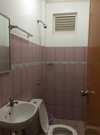 Imagen de la habitación del Hotel Coffee Swings Lodging House. Foto 28