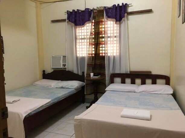 Imagen de la habitación del Hotel Coffee Swings Lodging House. Foto 29