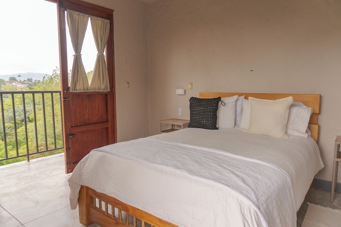 Imagen de la habitación del Hotel Coffee Tree Boutique Hostel. Foto 3