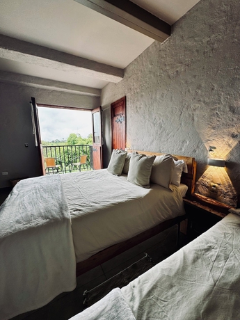 Imagen de la habitación del Hotel Coffee Tree Boutique Hostel. Foto 4