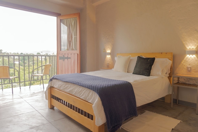 Imagen de la habitación del Hotel Coffee Tree Boutique Hostel. Foto 6
