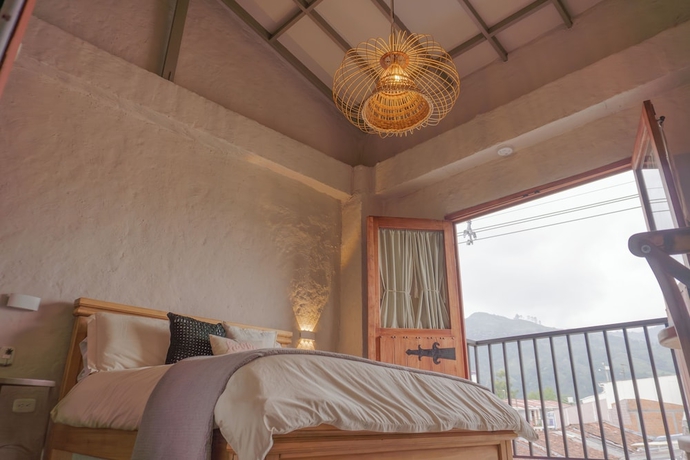 Imagen de la habitación del Hotel Coffee Tree Boutique Hostel. Foto 10