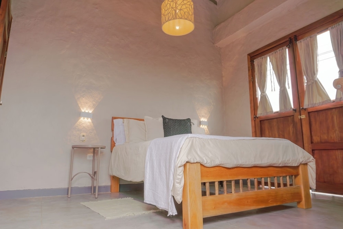 Imagen de la habitación del Hotel Coffee Tree Boutique Hostel. Foto 11