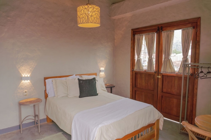 Imagen de la habitación del Hotel Coffee Tree Boutique Hostel. Foto 13