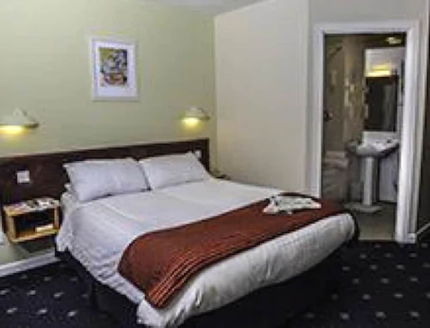 Imagen de la habitación del Hotel Cohannon Inn. Foto 7