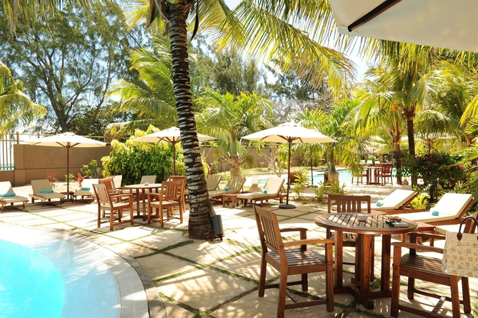 Imagen del bar/restaurante del Hotel Coin De Mire Attitude. Foto 2