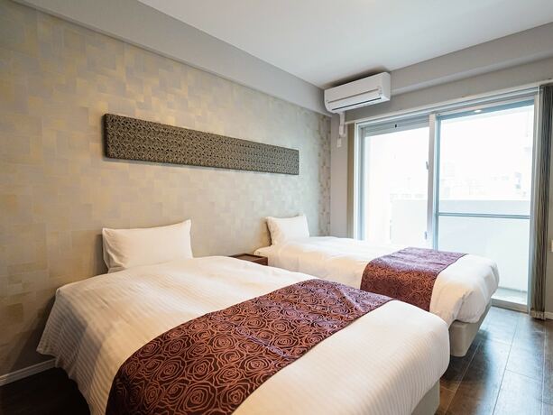 Imagen de la habitación del Hotel Coldio JointHome NAHA. Foto 26