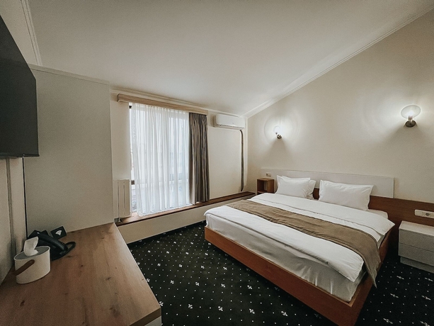 Imagen de la habitación del Hotel Colette. Foto 15