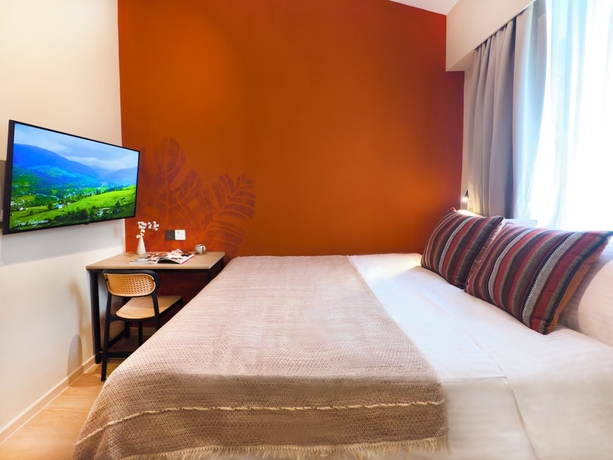 Imagen de la habitación del Hotel Coliwoo Bukit Timah Fire Station. Foto 9