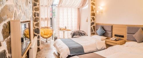 Imagen de la habitación del Hotel Collection - Home Resorts. Foto 7