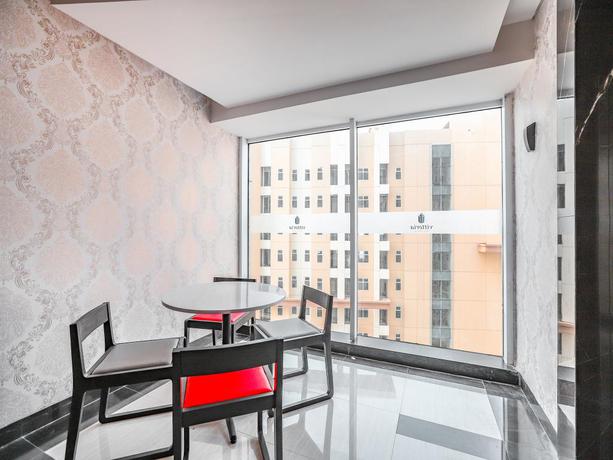 Imagen de los interiores del Hotel Collection O 16 Vittoria Residence. Foto 16