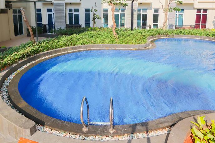 Imagen de la piscina del Hotel Collection O 18 Puri Orchard. Foto 18