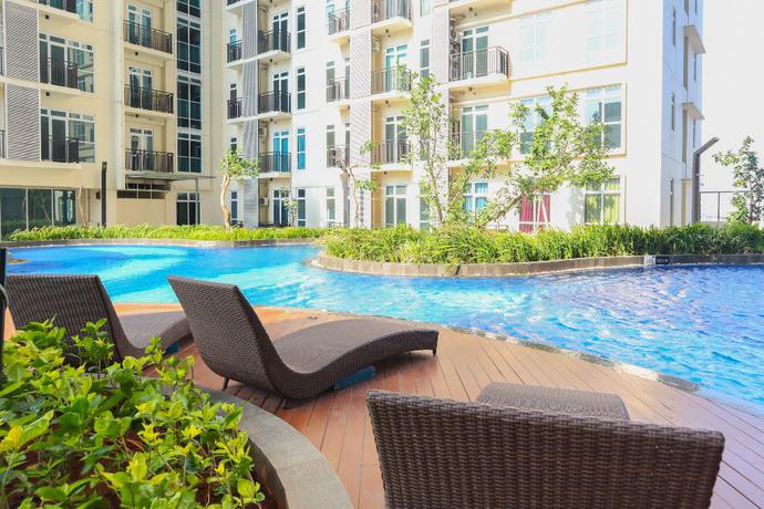 Imagen de la piscina del Hotel Collection O 18 Puri Orchard. Foto 19