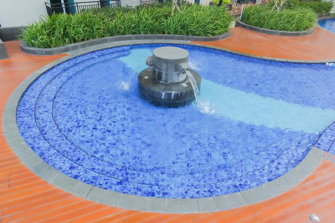 Imagen de la piscina del Hotel Collection O 18 Puri Orchard. Foto 20