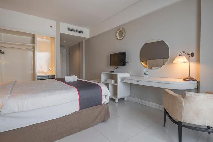 Imagen de la habitación del Hotel Collection O 19 Grand Malebu Makassar. Foto 5