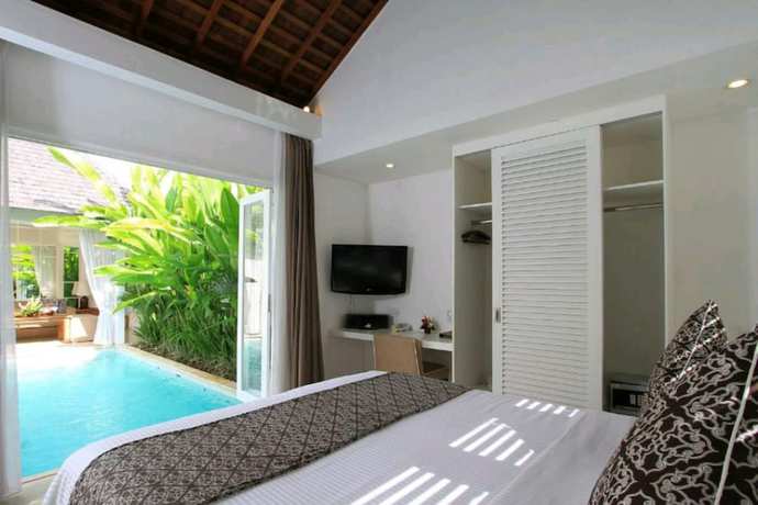 Imagen de la habitación del Hotel Collection O 20 Astana Kunti Seminyak. Foto 6