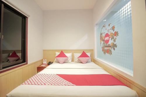 Imagen de la habitación del Hotel Collection O 295 Grha Ciumbuleuit Guest House. Foto 19